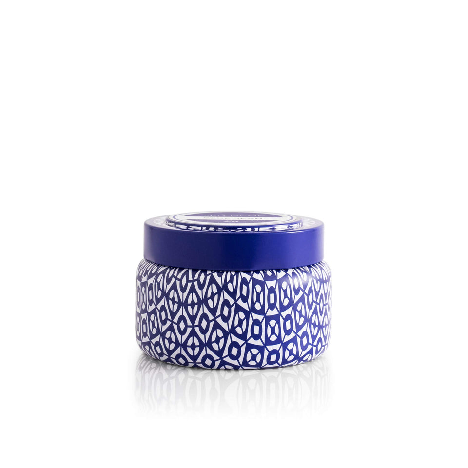 Capri Blue Volcano travel tin jar front view shows vibrant blue design and portable size.