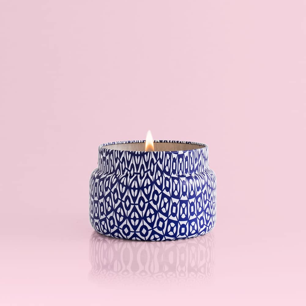 Capri Blue Volcano travel tin jar top view captures compact travel-friendly form.