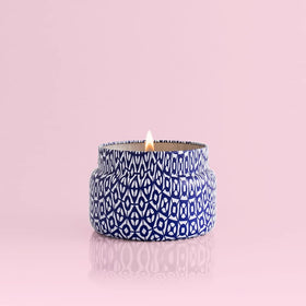Capri Blue Volcano travel tin jar top view captures compact travel-friendly form.