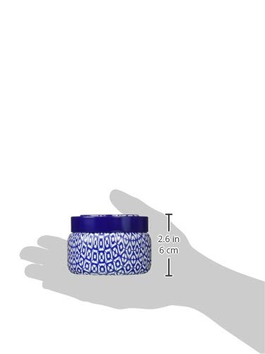 Capri Blue Volcano travel tin wax close-up shows soy wax and burn-ready surface.
