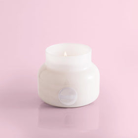 Capri Blue Volcano wick care for even burn and longevity.