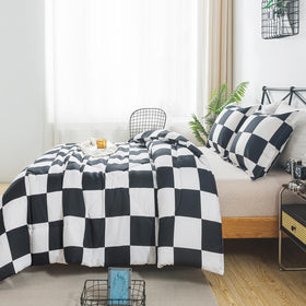 Caressma down-alternative fill offers lightweight warmth for year-round comfort.