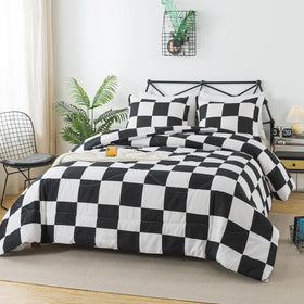 Caressma plaid bedding close-up highlights soft microfiber and breathable, plush warmth.