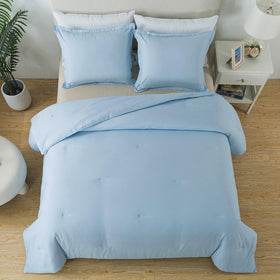 Caressma ultra-soft microfiber comforter delivers plush warmth and breathability.