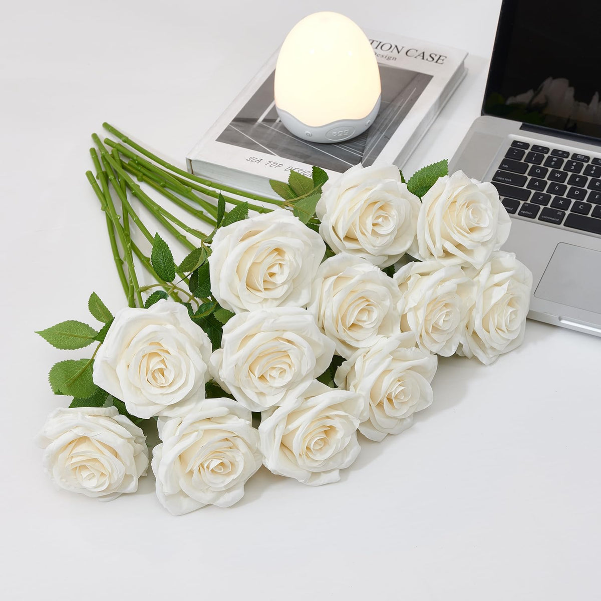 Carlita's Blooms ivory roses arranged in a wreath for doors and walls
