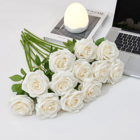 Carlita's Blooms ivory roses arranged in a wreath for doors and walls