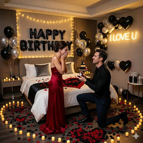 Carnira black matte balloons provide a sleek, masculine base theme.