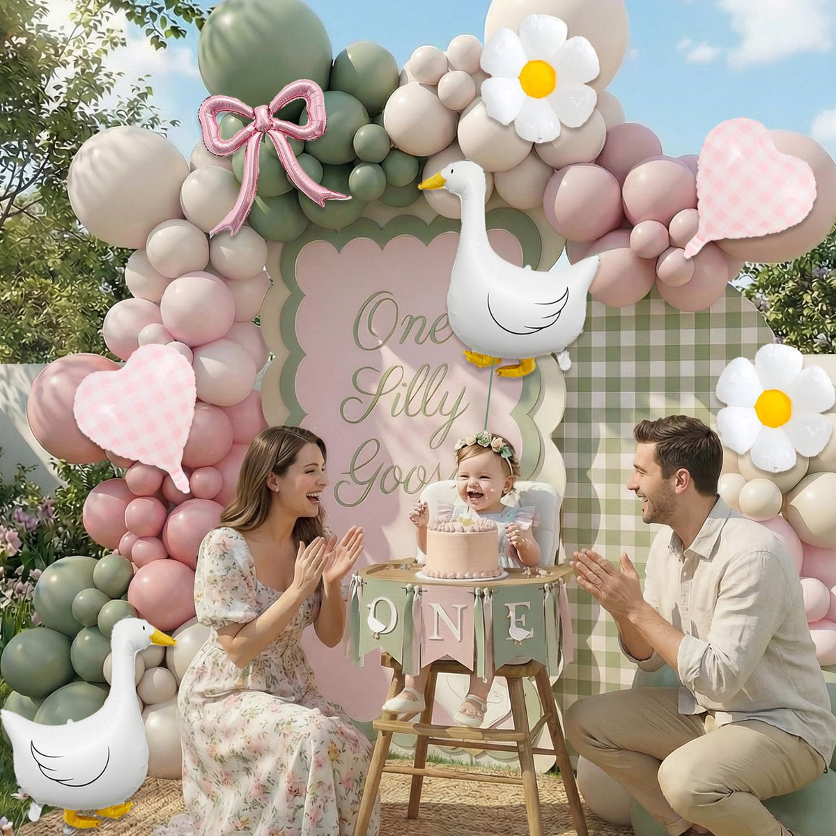 Carnira daisy foil balloons enhance the photo-worthy arch and backdrop.