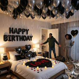 Carnira metallic silver balloons enhance the elegant party atmosphere.
