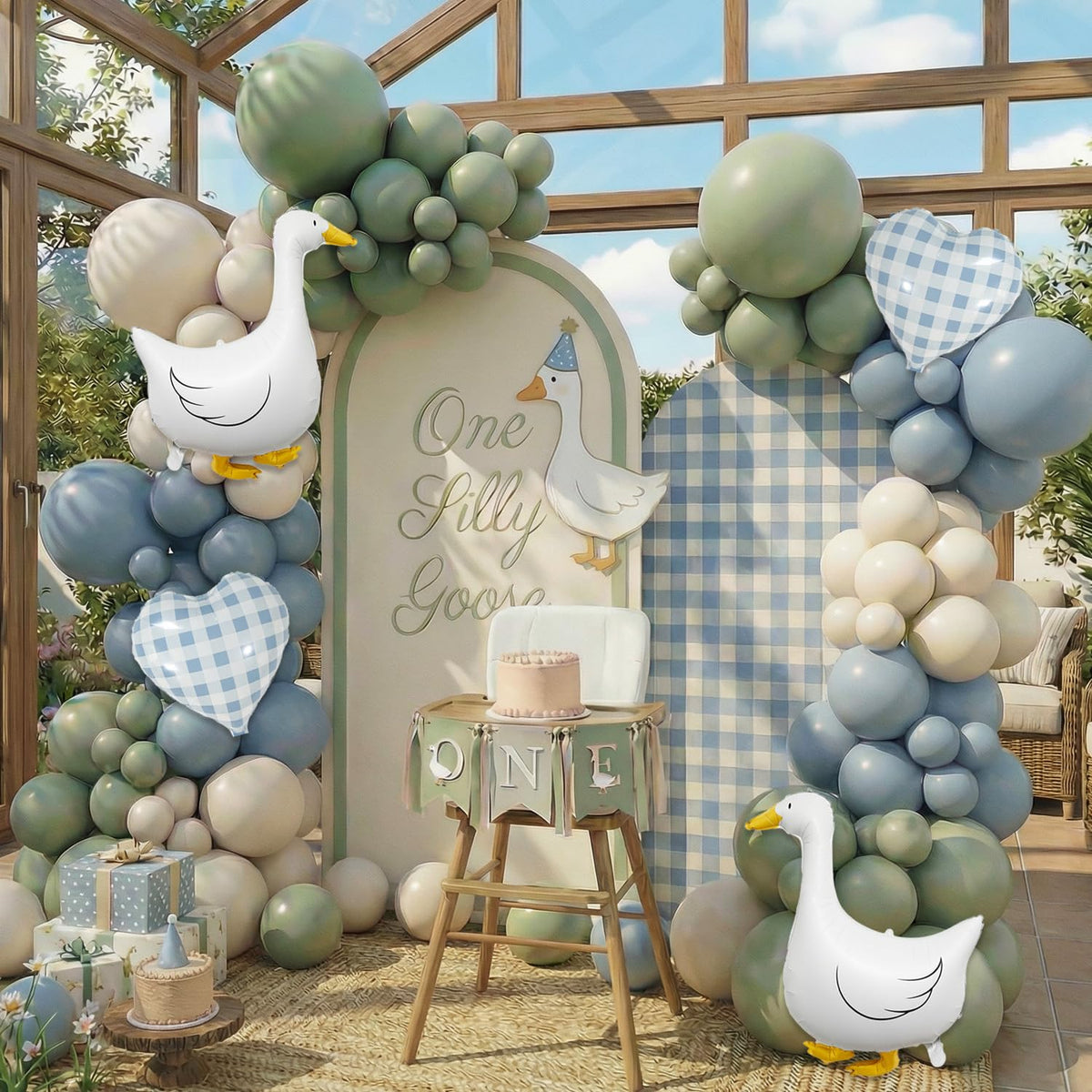Carnira One Silly Goose arch with sage green and dusty blue balloons for chic photos