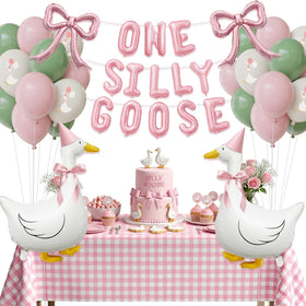 Carnira One Silly Goose balloons creating a baby birthday centerpiece and photos