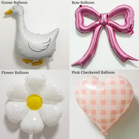 Carnira pink bow balloon accents for delightful focal points in arches.