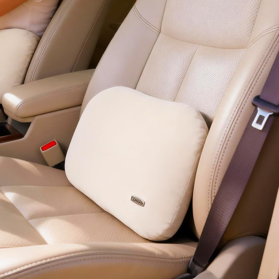 Carwales beige lumbar pillow for car-seat provides lower-back support during long drives.