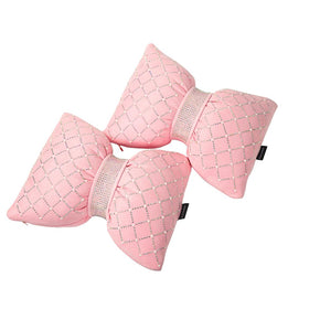 Carwales pink bow headrest pillow for cozy long drives.