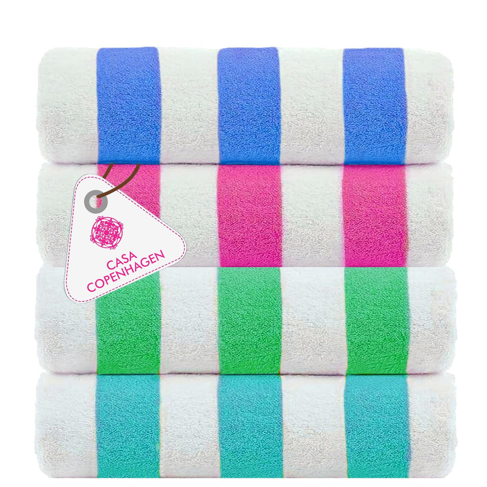 Casa Copenhagen Cabana teal stripe towel provides soft cotton comfort for beach trips.