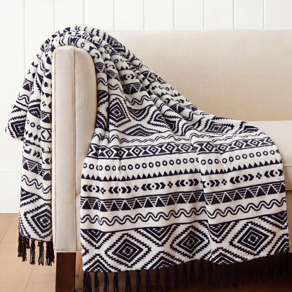 CASAAGUSTO boho throw blanket with tassel on couch for cozy style