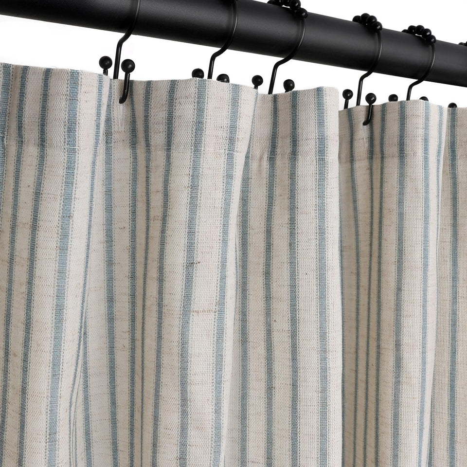 CasaTena Farmhouse striped curtain in dusty blue adds rustic bathroom charm.
