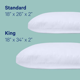 Casper Sleep Essential Pillow king size on bed supports side back and stomach sleepers.