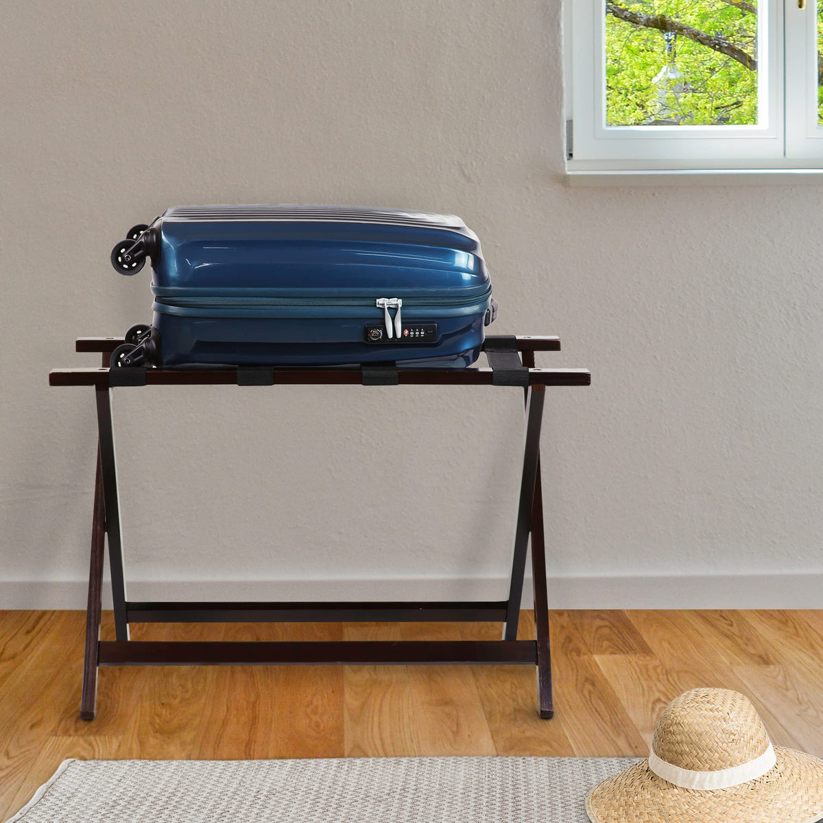 Casual Home luggage rack in guest room showing busy-home use