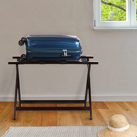 Casual Home luggage rack in guest room showing busy-home use