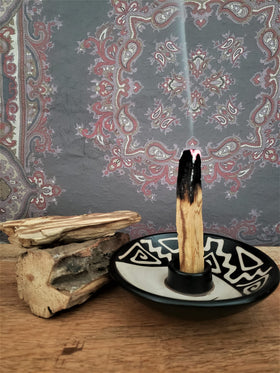 Palo Santo ritual-smudge set arranged for cleansing and focus
