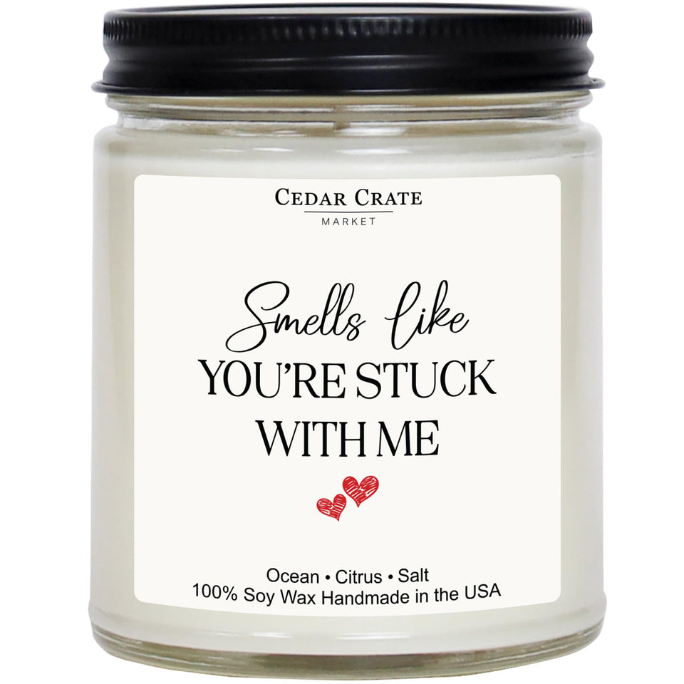CEDAR CRATE MARKET Anniversary Candle in a clear jar enhances decor.