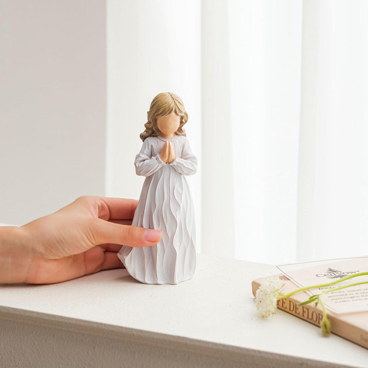 CedVow angel figurine fits nativity displays or prayer corners.