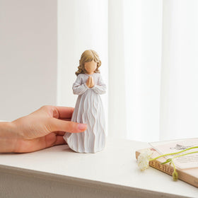 CedVow angel figurine fits nativity displays or prayer corners.