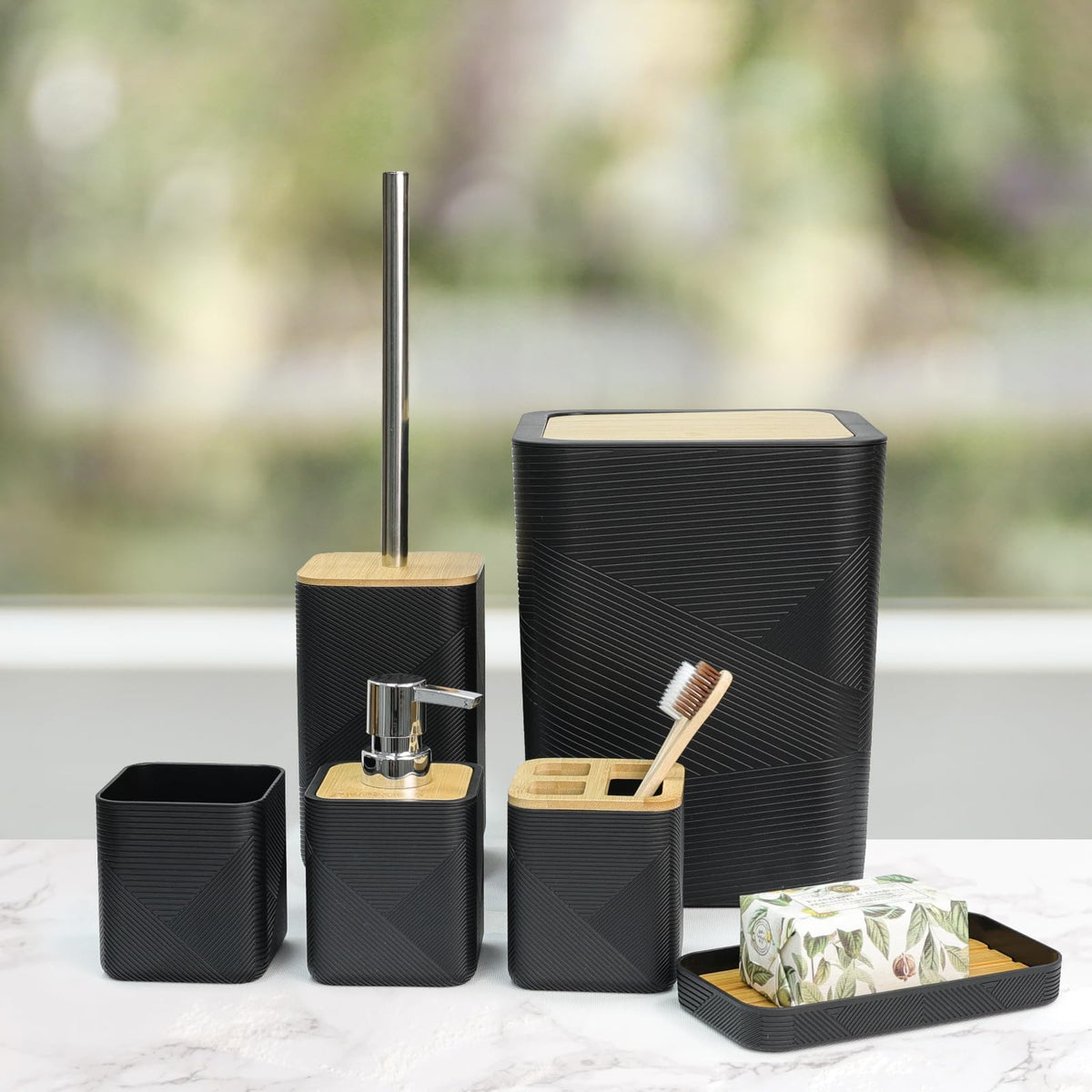 CERBIOR trash can complements the set with a compact, stylish silhouette