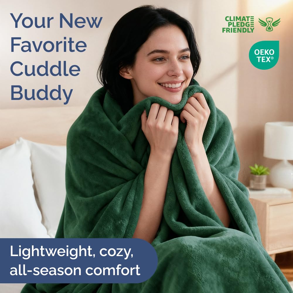 CGK Unlimited all-season blanket on a couch for year-round comfort.