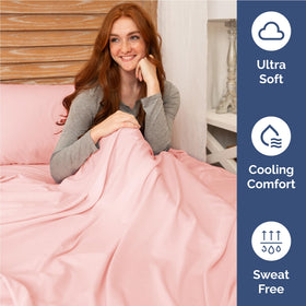 CGK Unlimited baby pink deep-pocket image emphasizes secure fit across most beds.