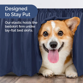 Easy-clean navy bedskirt from CGK Unlimited fits queen beds beautifully.