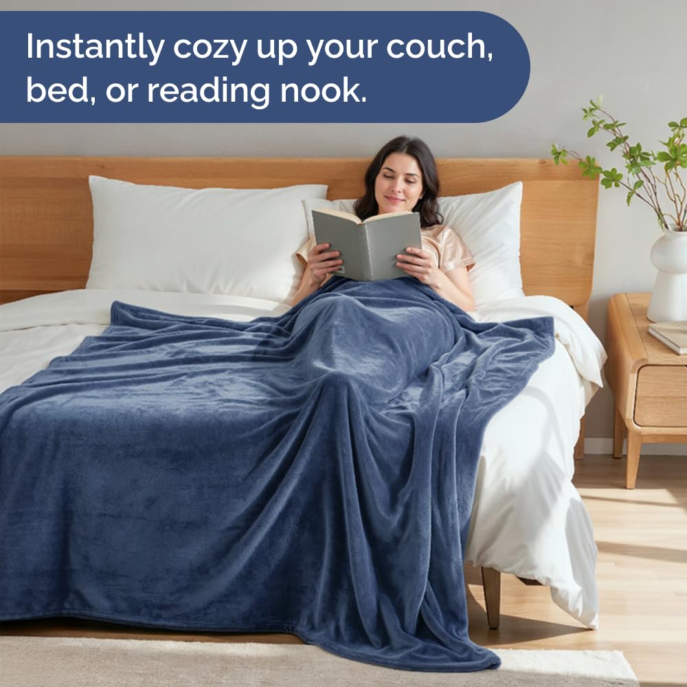 CGK Unlimited blanket on couch emphasizes versatility for lounging.