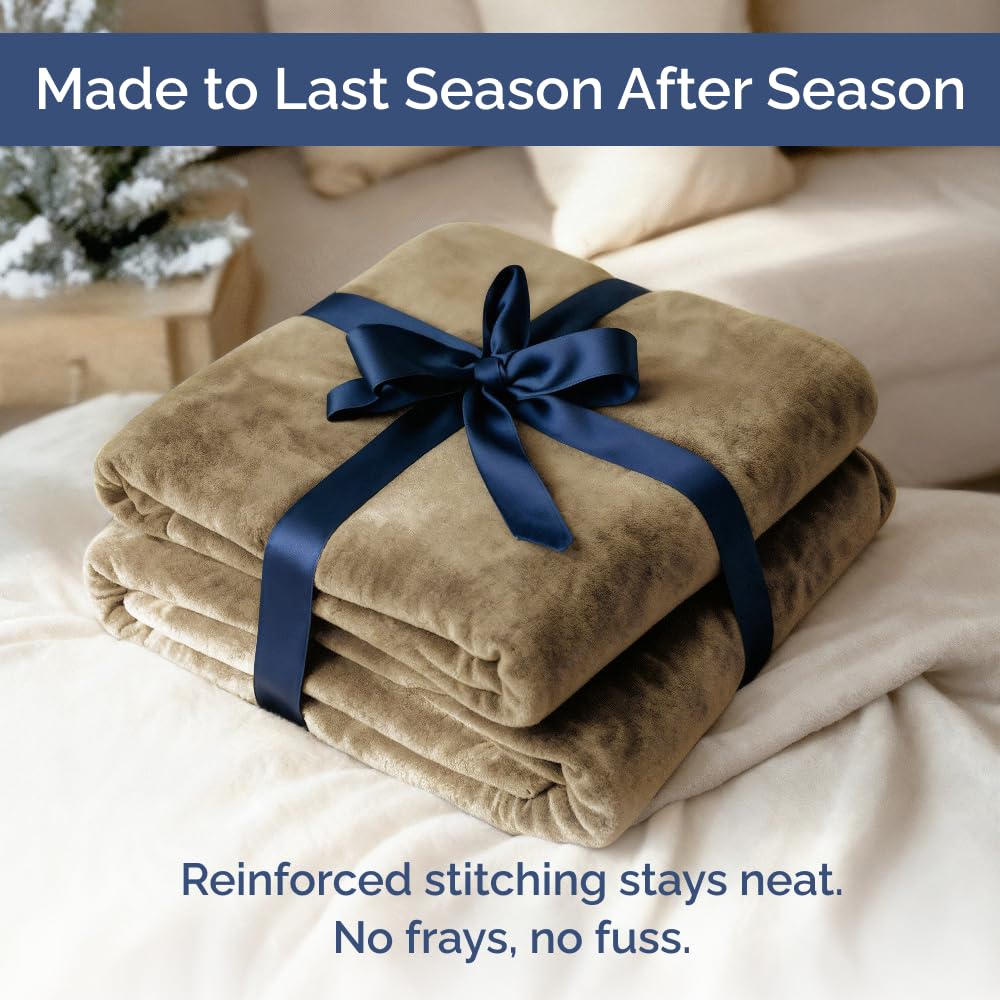 CGK Unlimited camel-colored microplush fleece blanket adds cozy ambience to any room