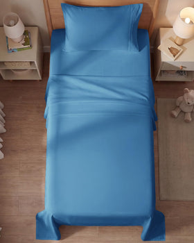 CGK Unlimited denim blue sheet set demonstrates easy fit with elastic edges.