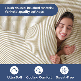 CGK Unlimited king duvet cover with two beige-stripe shams neatly arranged on bed.