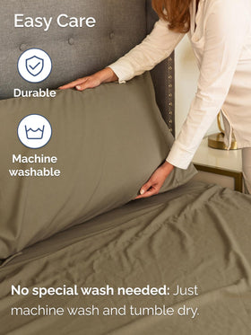 Bedroom setup with khaki sheets evokes hotel-inspired luxury and comfort.