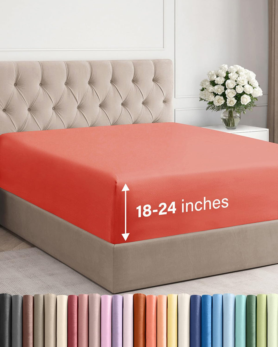 CGK Unlimited extra-deep queen fitted sheet in coral with secure elastic edges for deep mattresses.