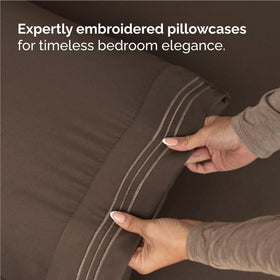 CGK Unlimited fitted sheet 75x54 displaying snug fit on mattress.
