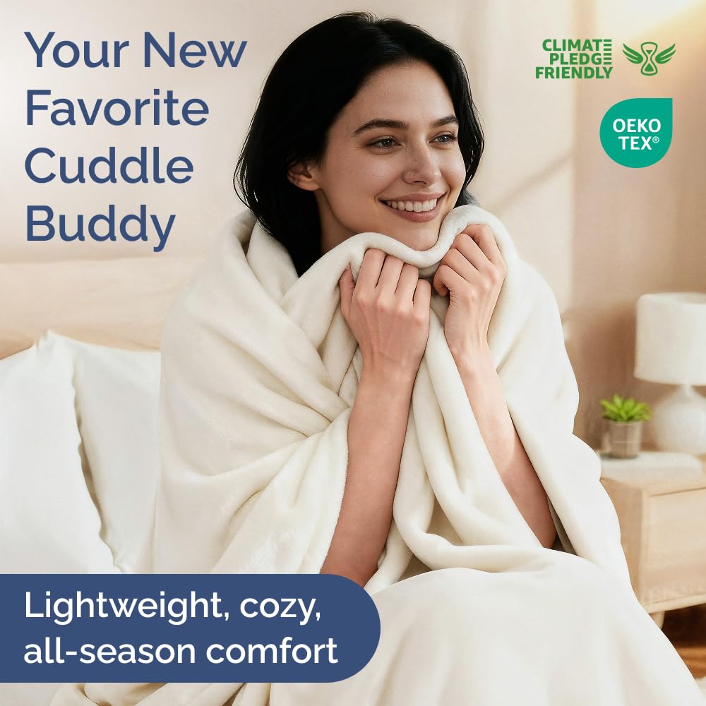 CGK Unlimited queen-size fleece blanket on bed highlights luxurious texture.