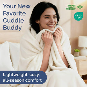 CGK Unlimited queen-size fleece blanket on bed highlights luxurious texture.
