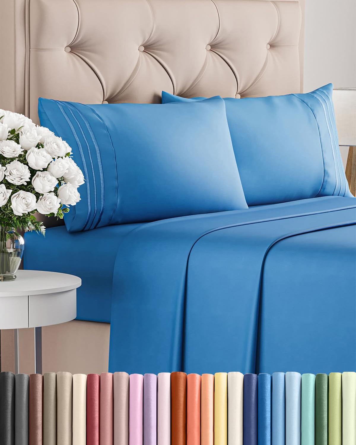 CGK Unlimited royal blue sheet set folded on bed, silky soft and breathable