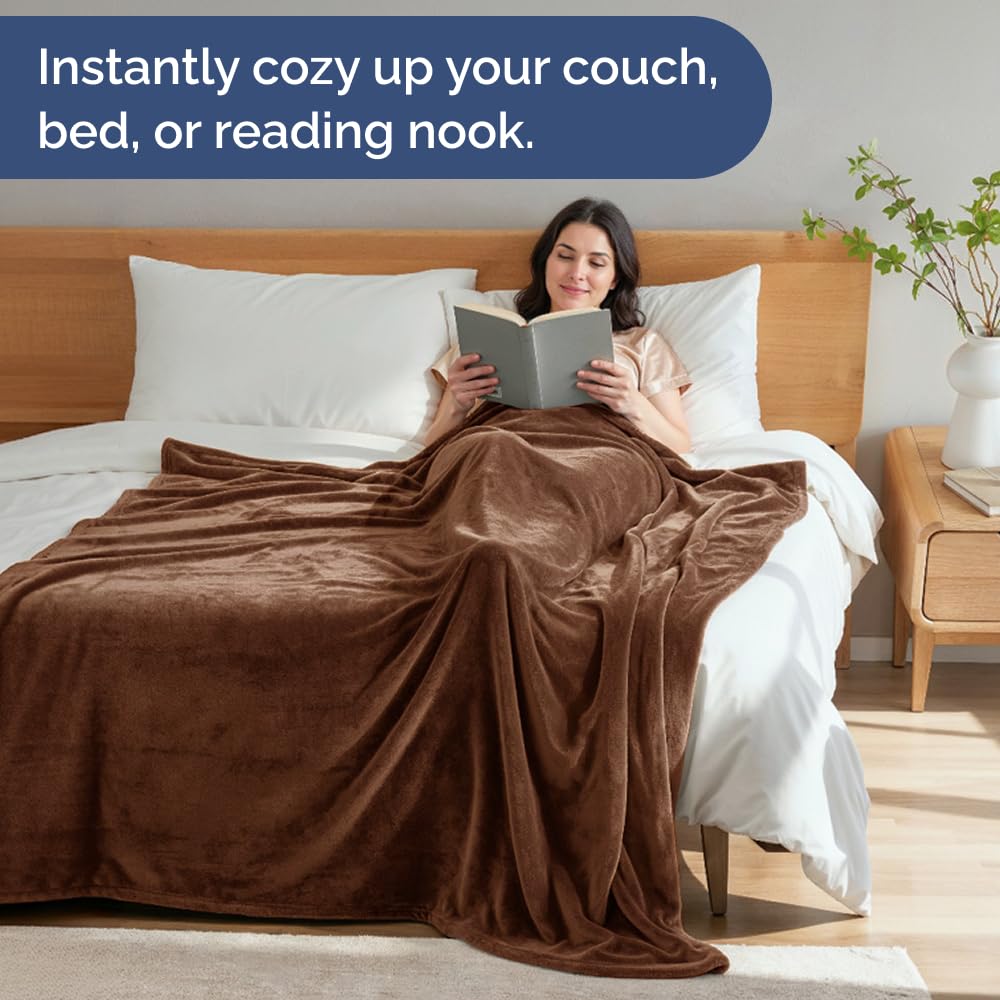 CGK Unlimited king-size blanket displayed on a couch for living room warmth