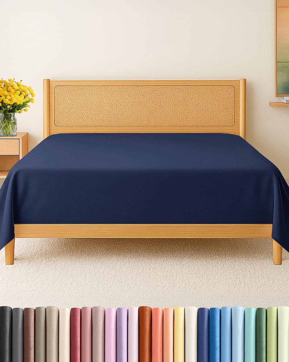 CGK Unlimited king size flat sheet folded neatly on a bed for a sleek, protective layer