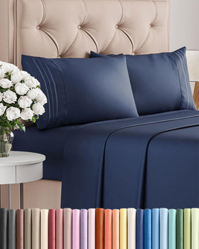 CGK Unlimited king-size navy blue sheet set folded, showcasing premium softness.