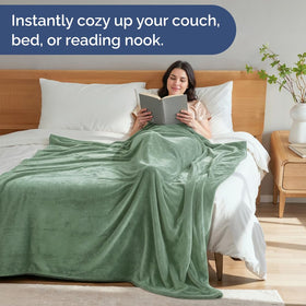 CGK Unlimited lightweight all-season blanket on couch for year-round warmth.