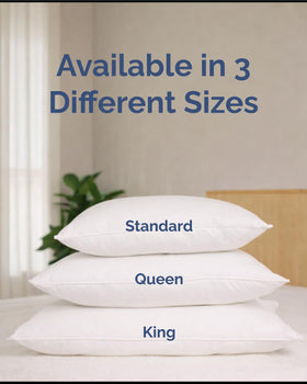 CGK Unlimited Linens king pillows on bed in a cozy bedroom.