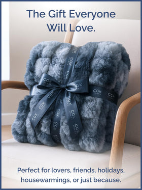 CGK Unlimited machine-washable blue faux fur throw ready for everyday use