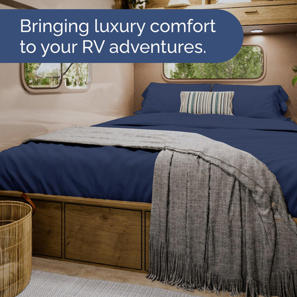 CGK Unlimited navy blue bedding on bed emphasizes premium hotel-like comfort.