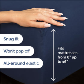 CGK Unlimited navy blue flat sheet drapes smoothly over the bed for a hotel look.